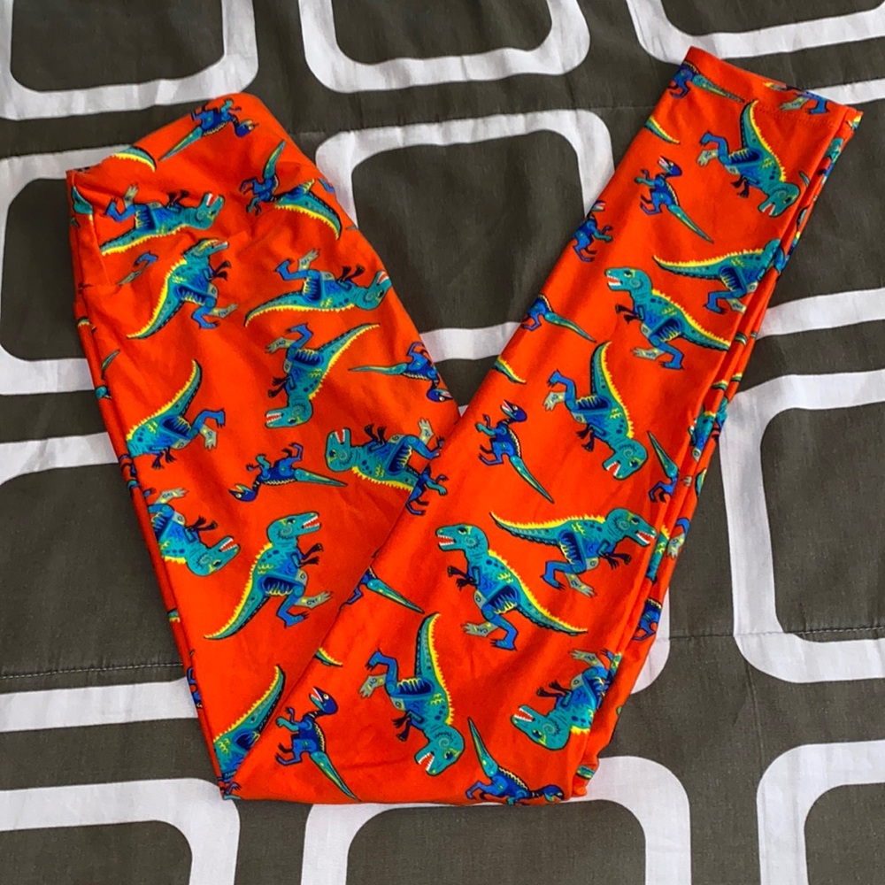 LuLaRoe Orange Leggings with Blue & Green Dinosaur Print